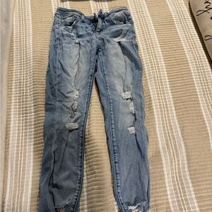 Women's Distressed Blue Jeans